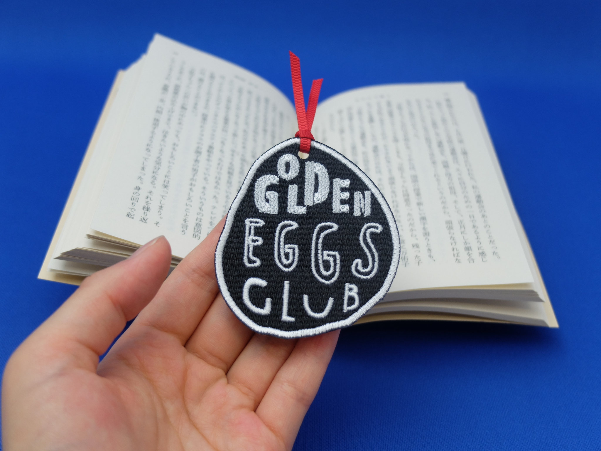 英語教室のロゴマークを刺繍しおりに Golden Eggs Club Color Stitch